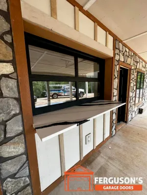 Commercial garage door installation in downtown Roanoke storefront